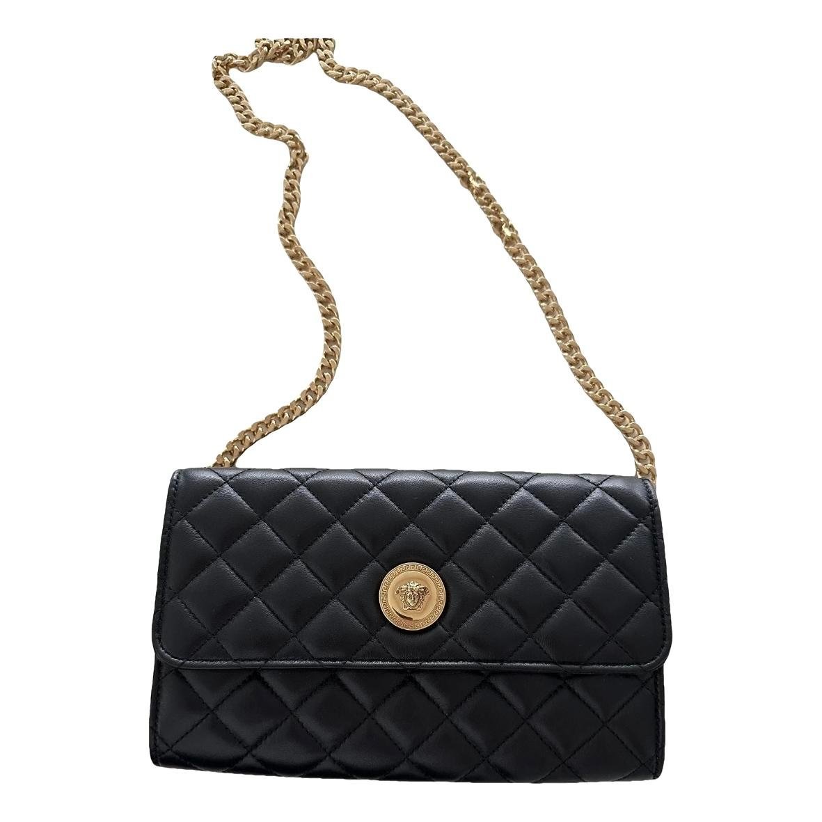 La Medusa leather clutch bag