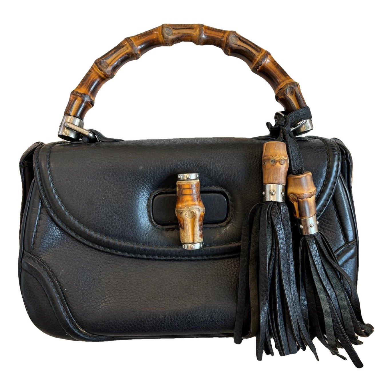 Convertible Pompon Bamboo Top Handle leather handbag