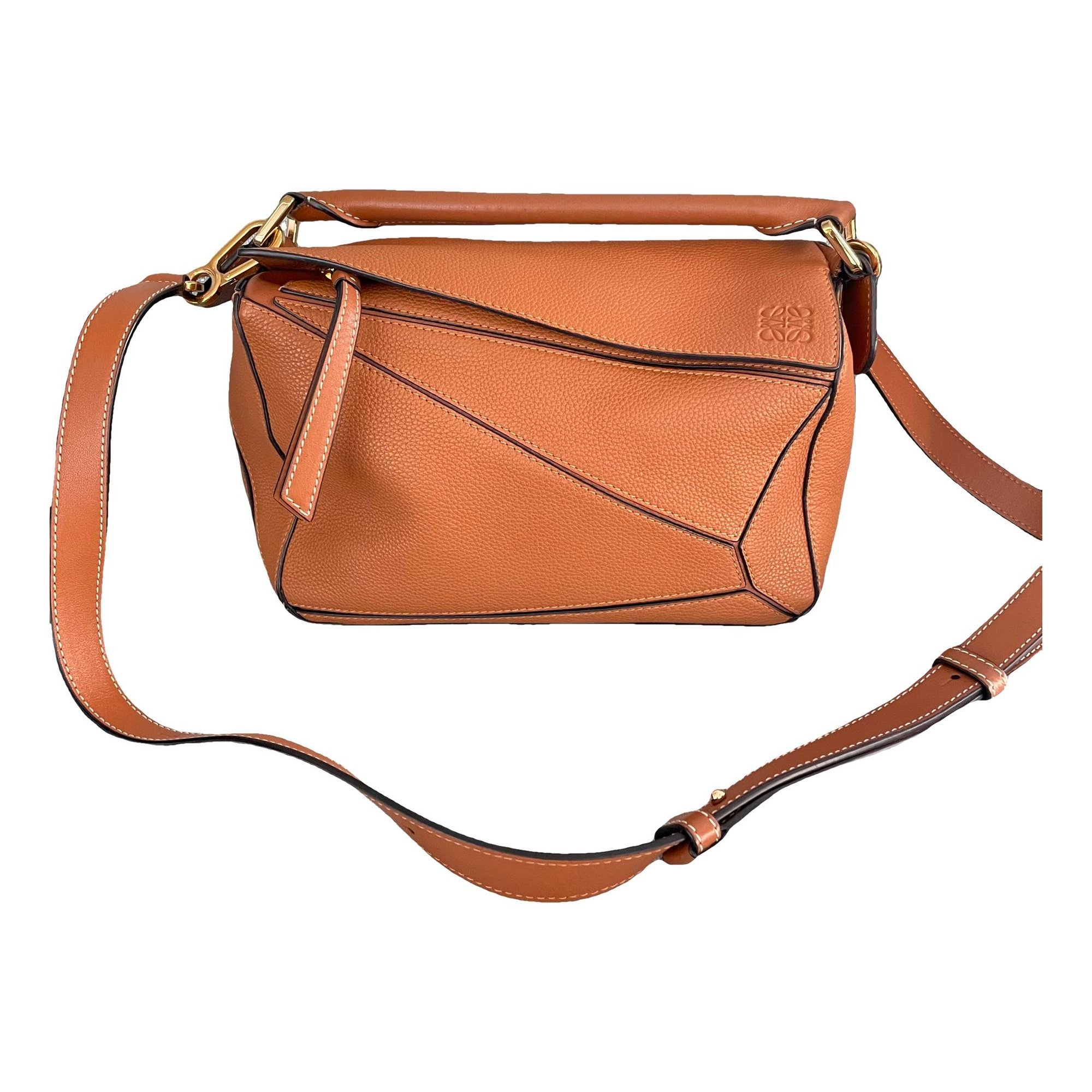 Puzzle leather handbag