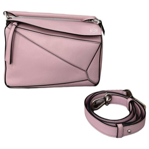 Puzzle leather handbag