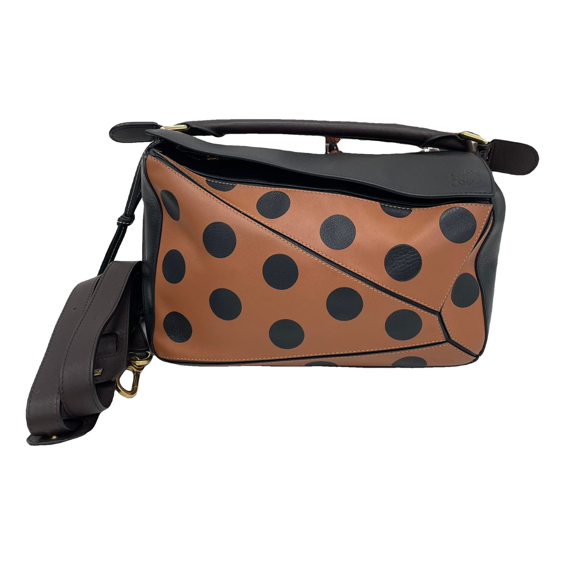 Puzzle leather handbag