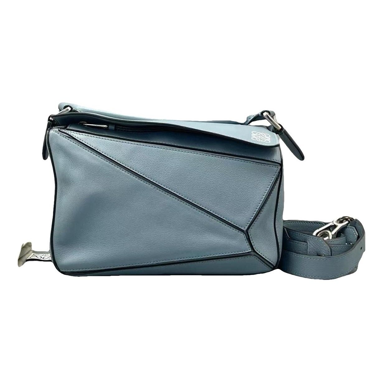 Puzzle leather handbag