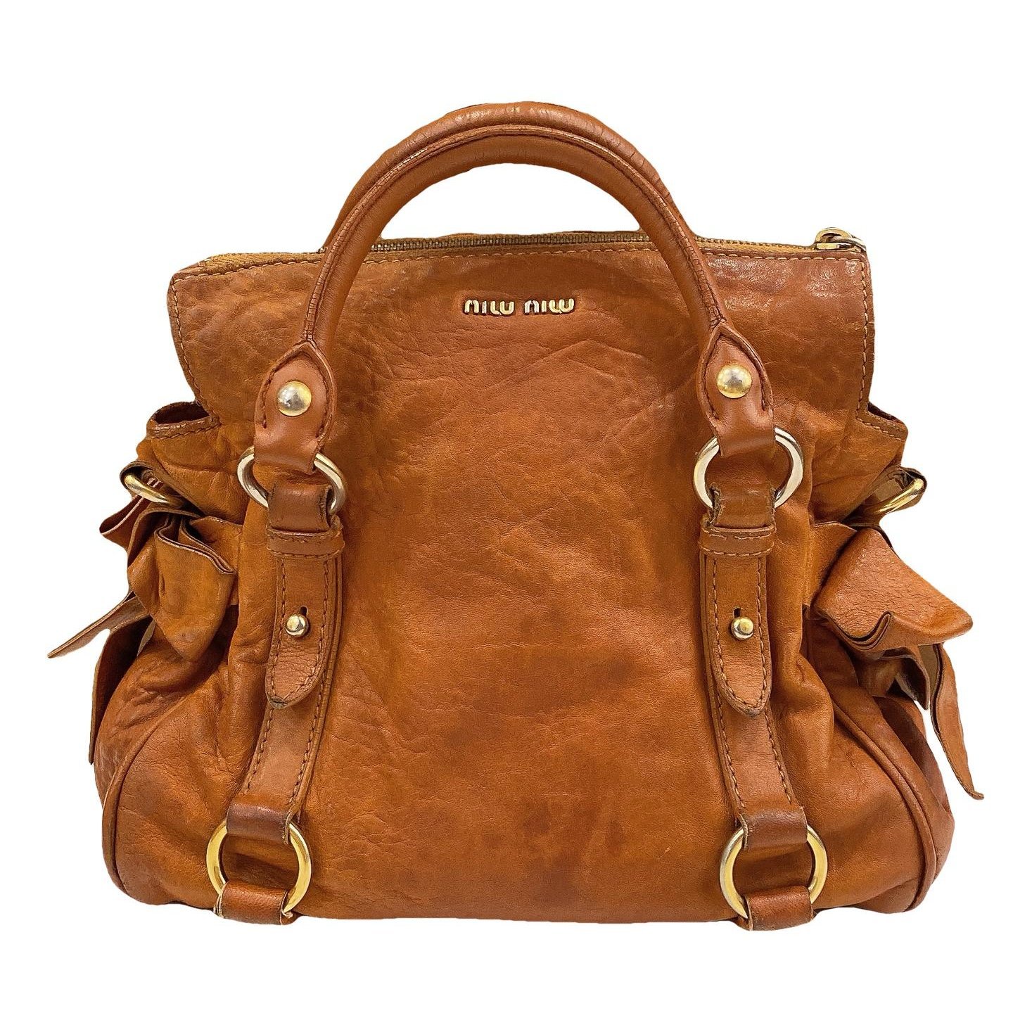 Bow bag leather handbag