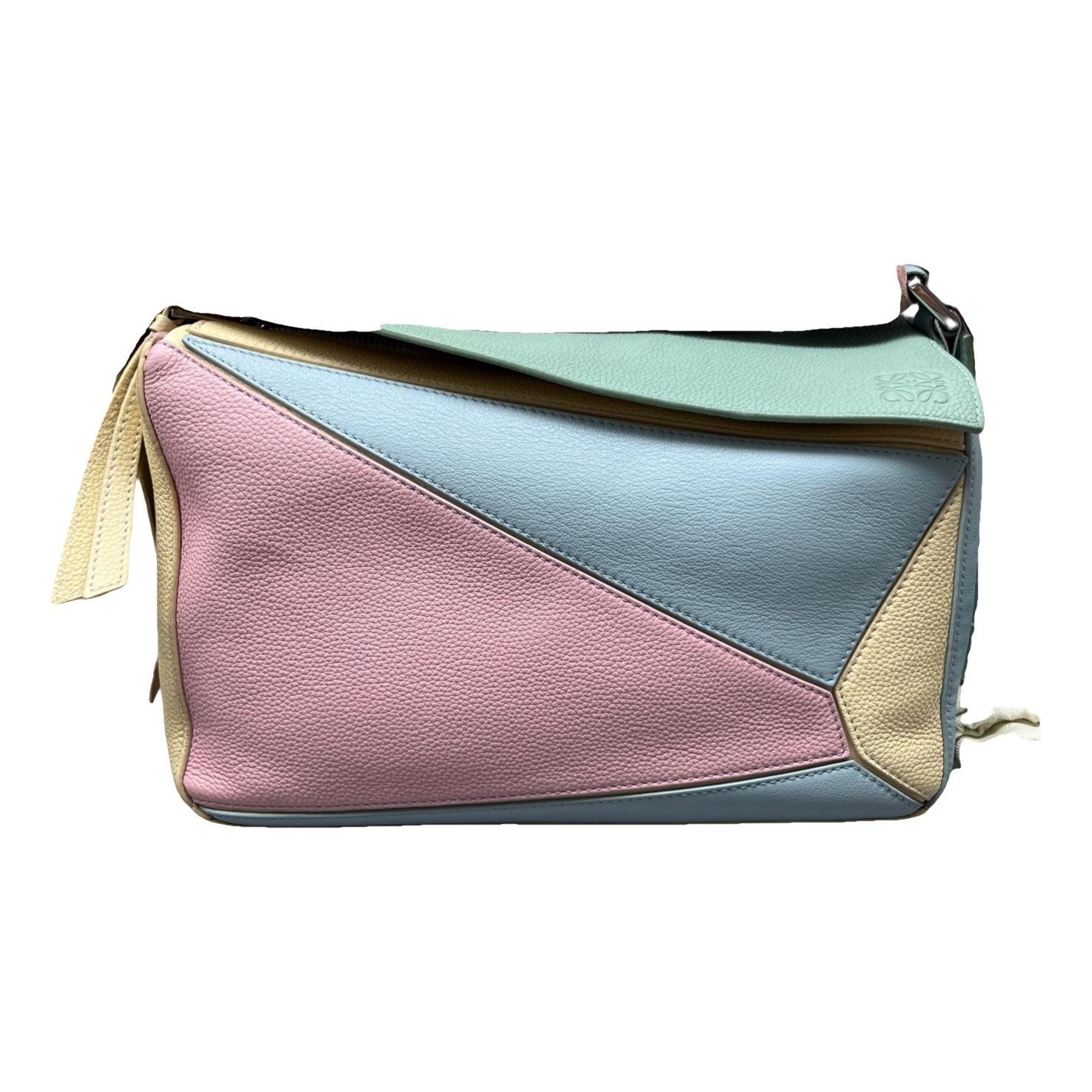 Puzzle leather handbag