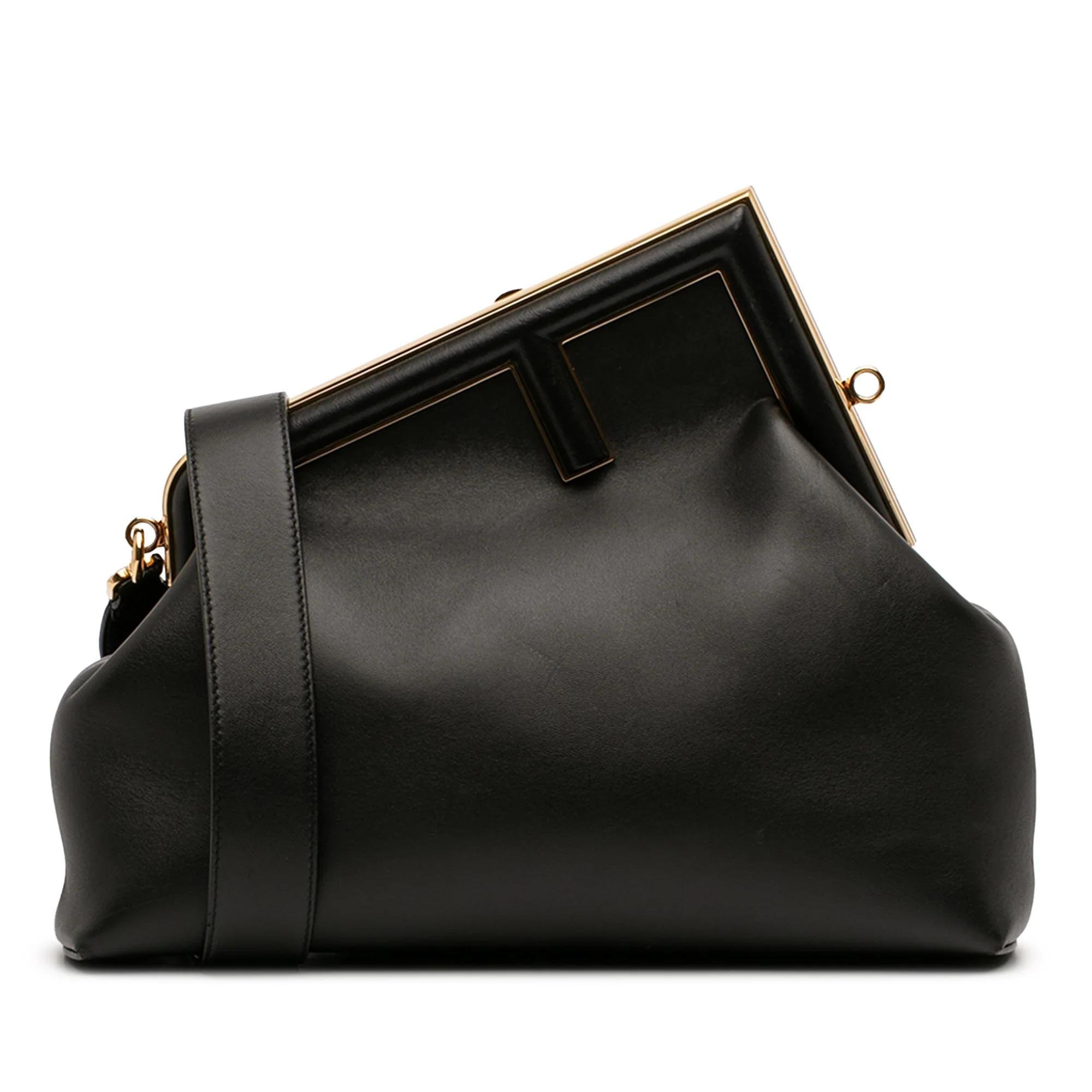 First leather handbag