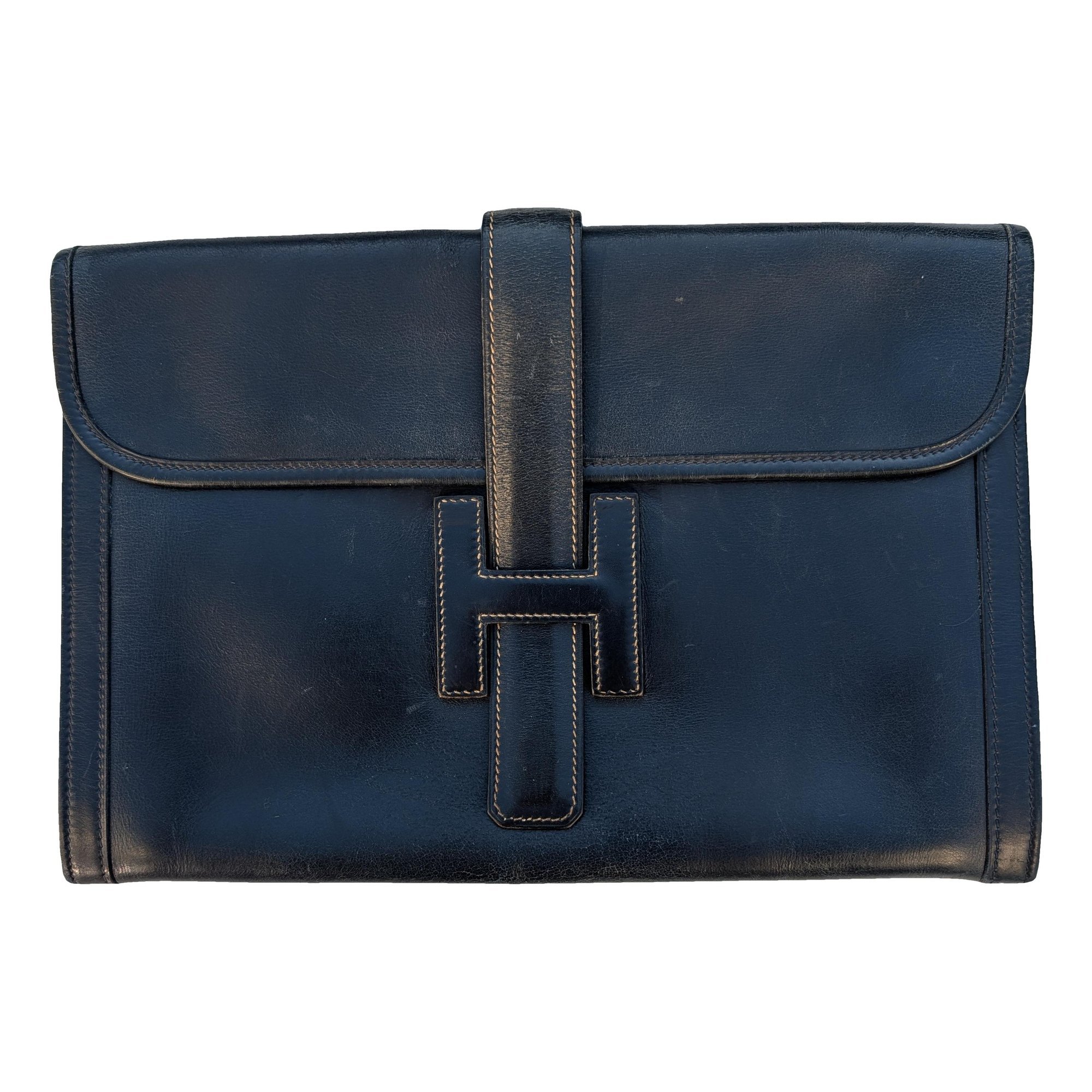 Jige leather clutch bag