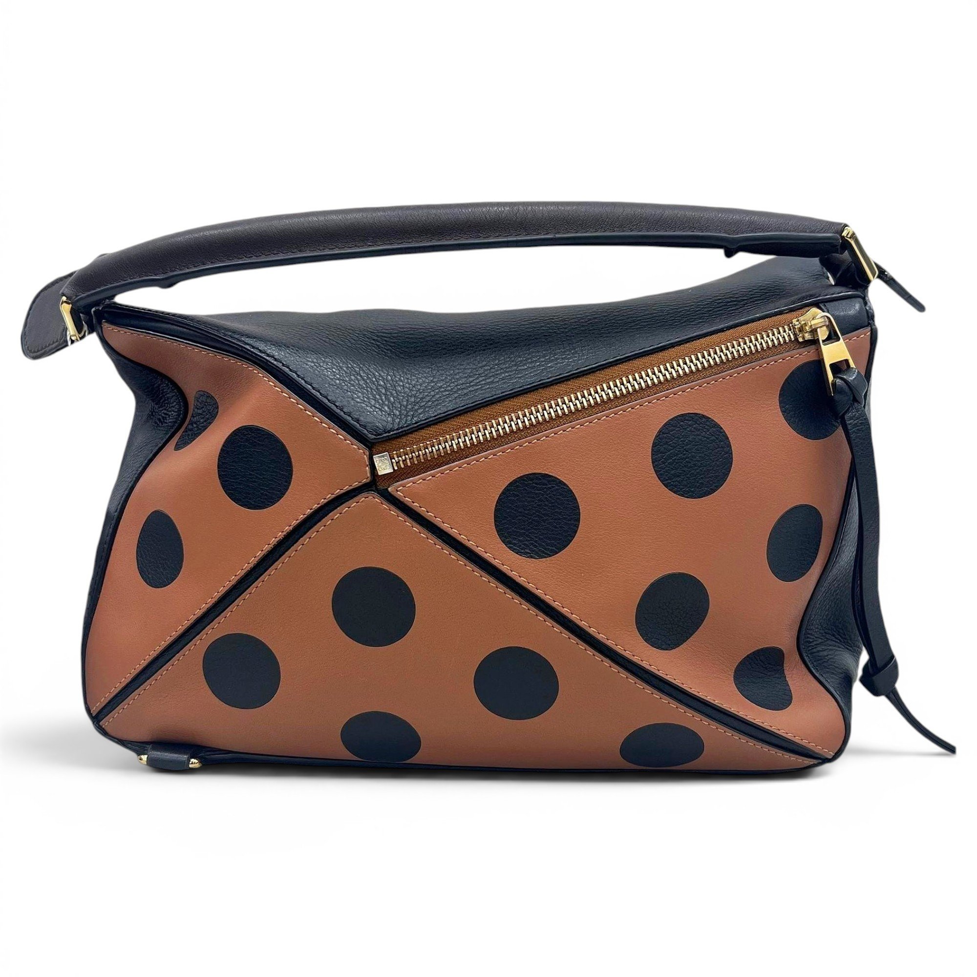 Puzzle leather handbag
