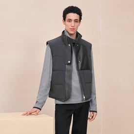 Quilted vest with leather detail