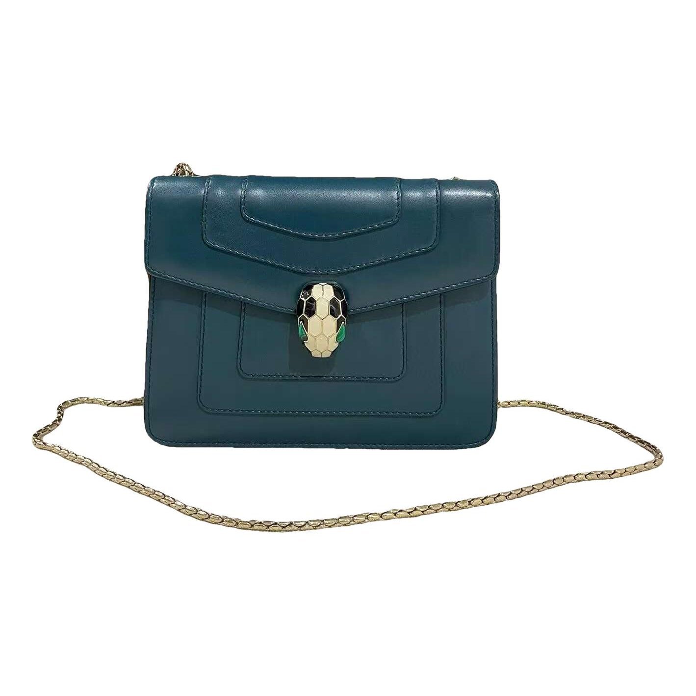 Serpenti leather handbag