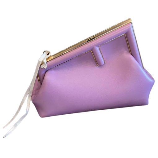 First leather handbag