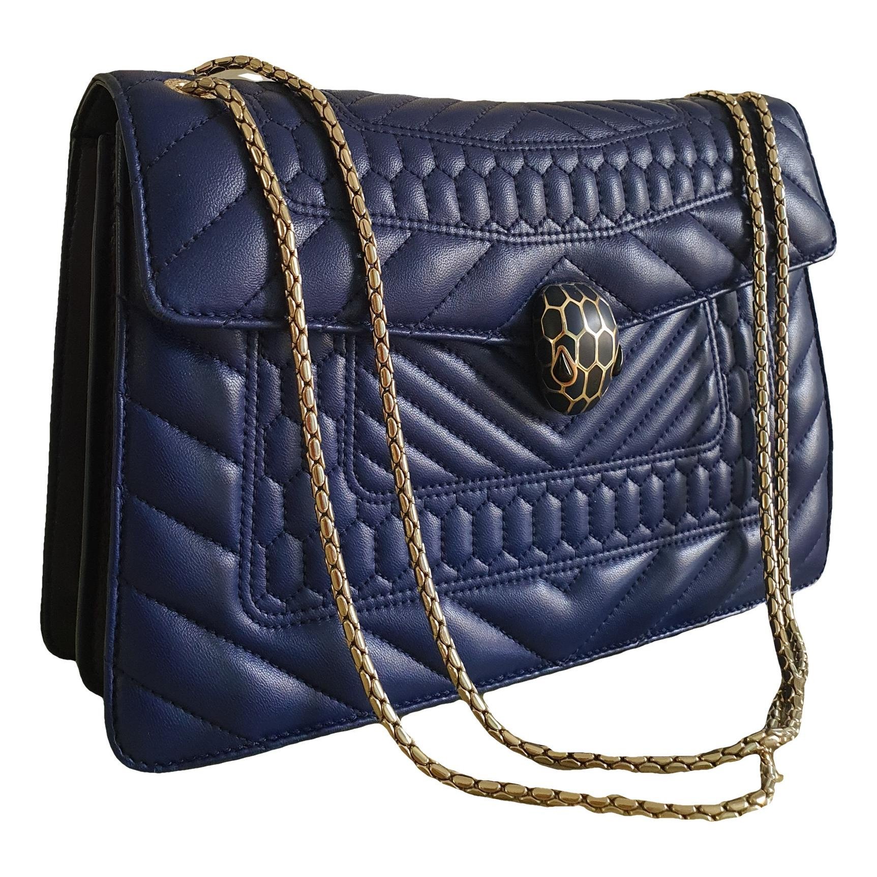 Serpenti leather handbag