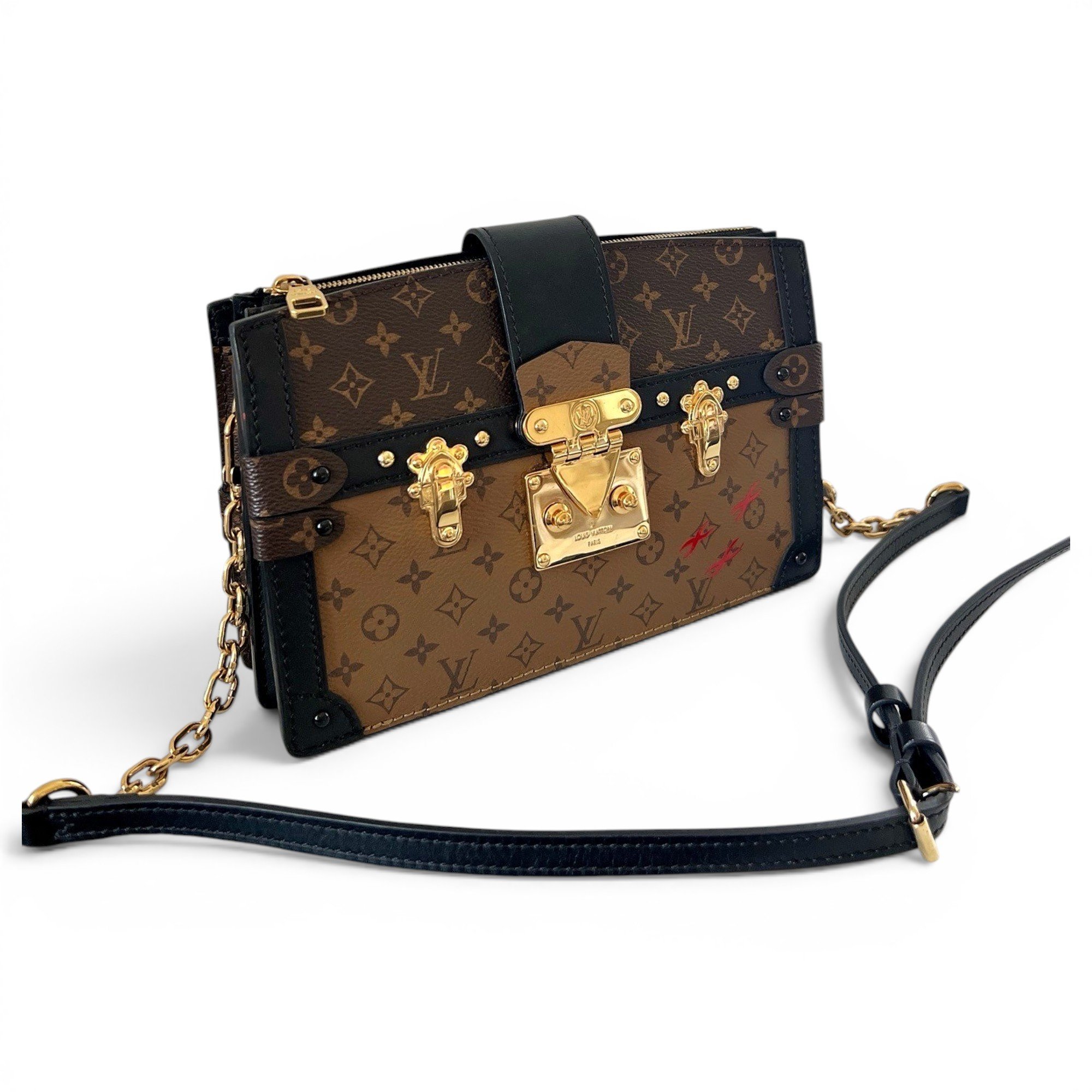 Pochette Trunk leather handbag