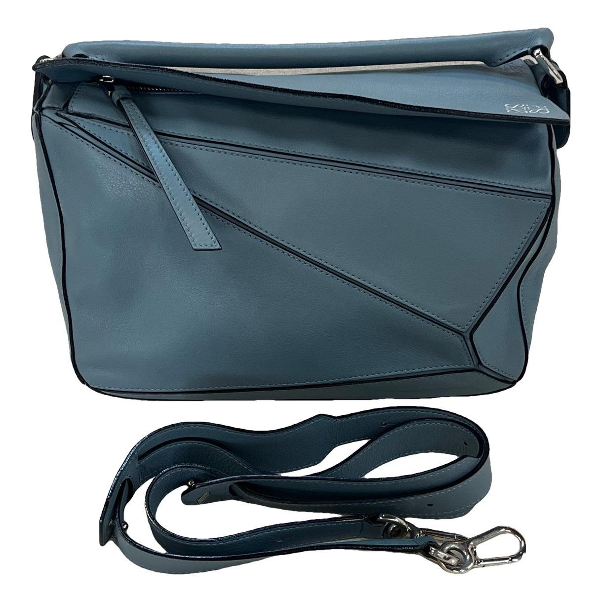 Puzzle leather handbag