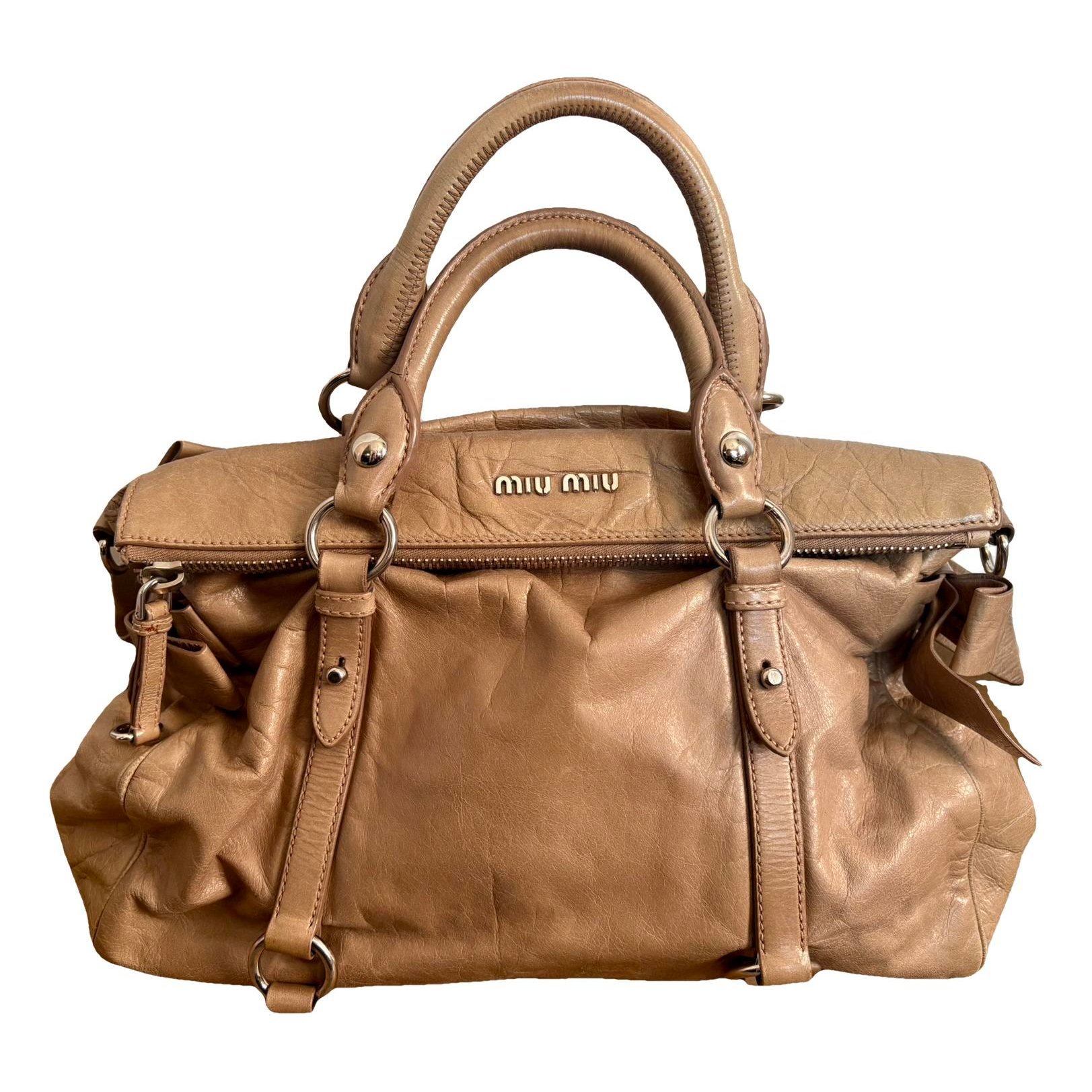 Bow bag leather handbag