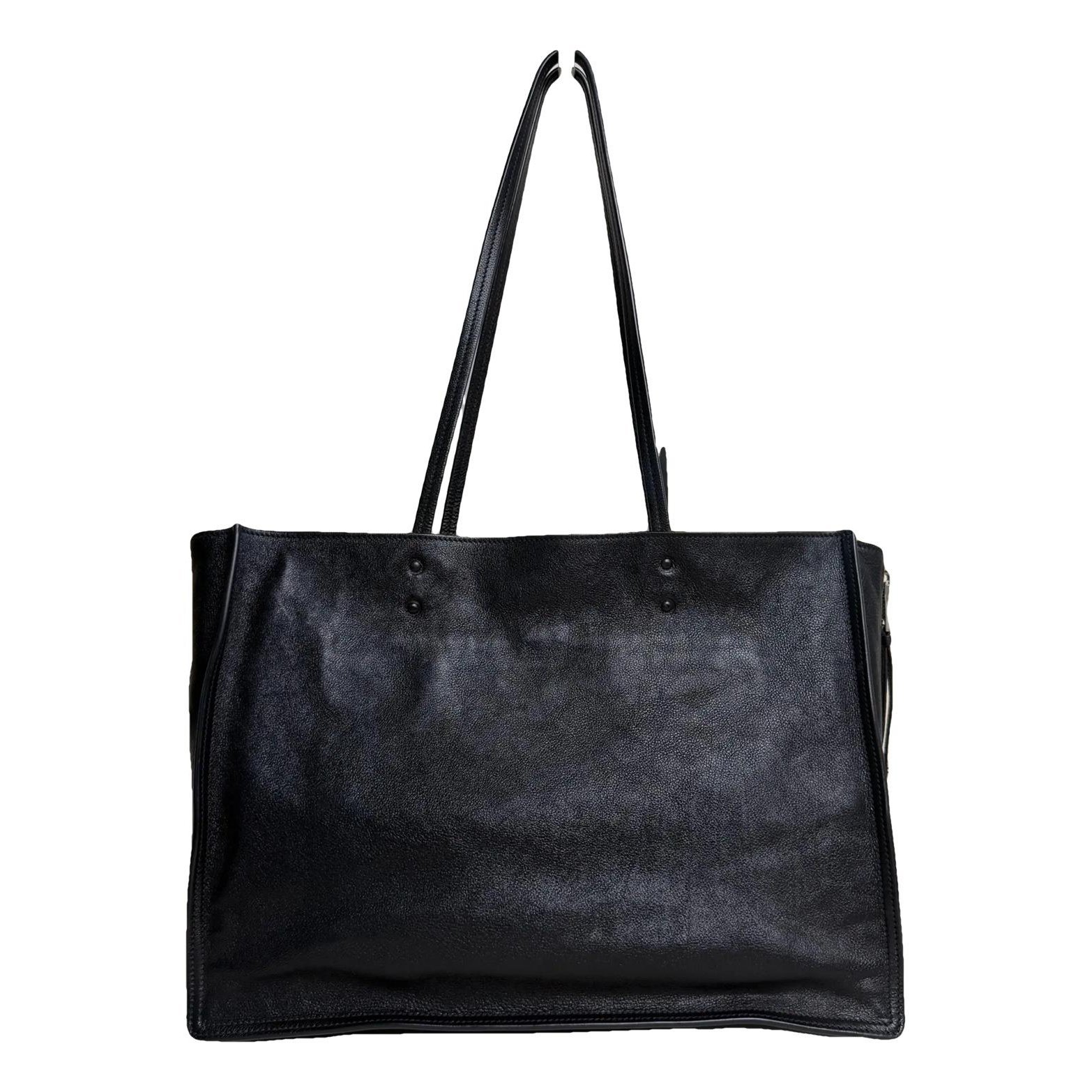 Etiquette leather handbag