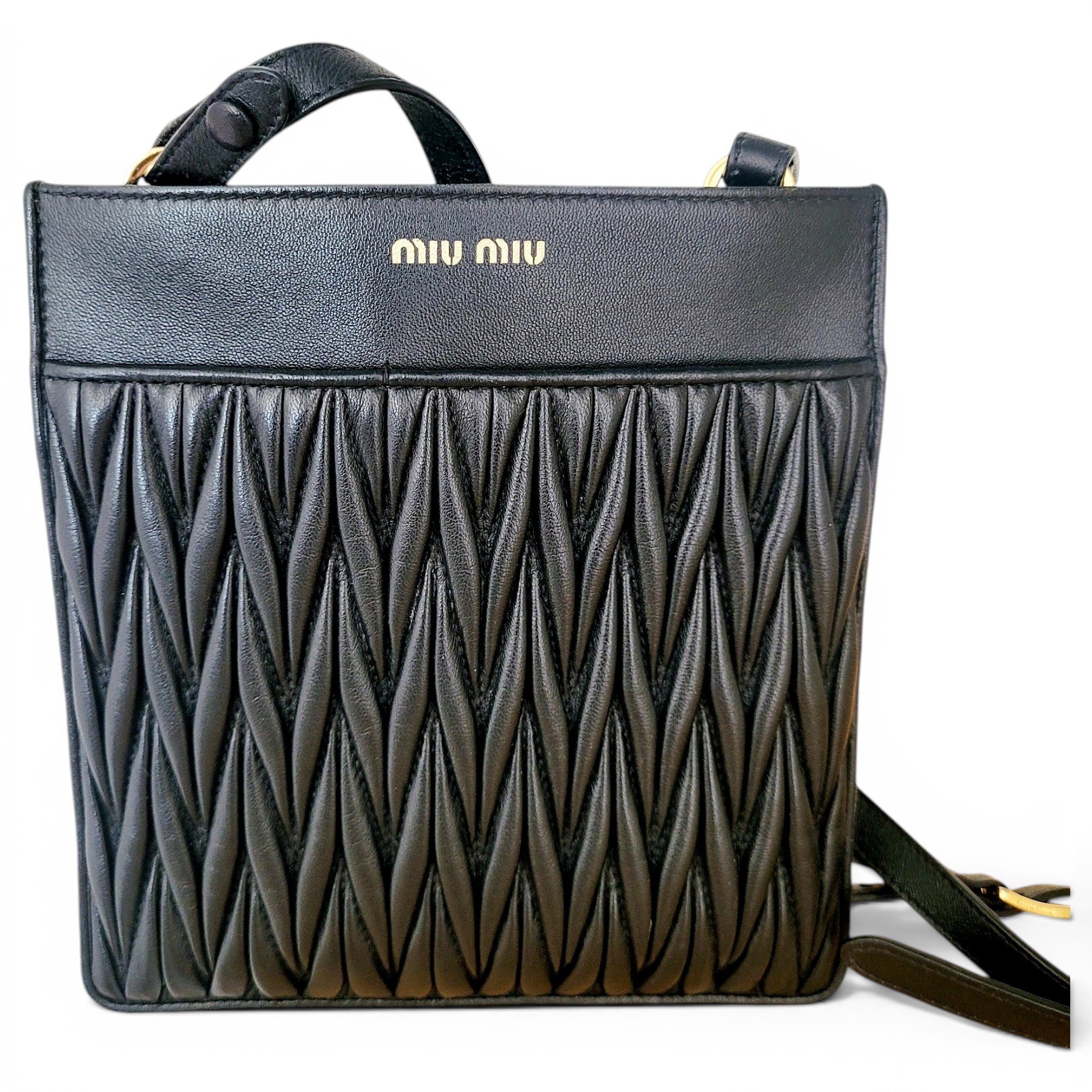 Matelassé leather clutch bag