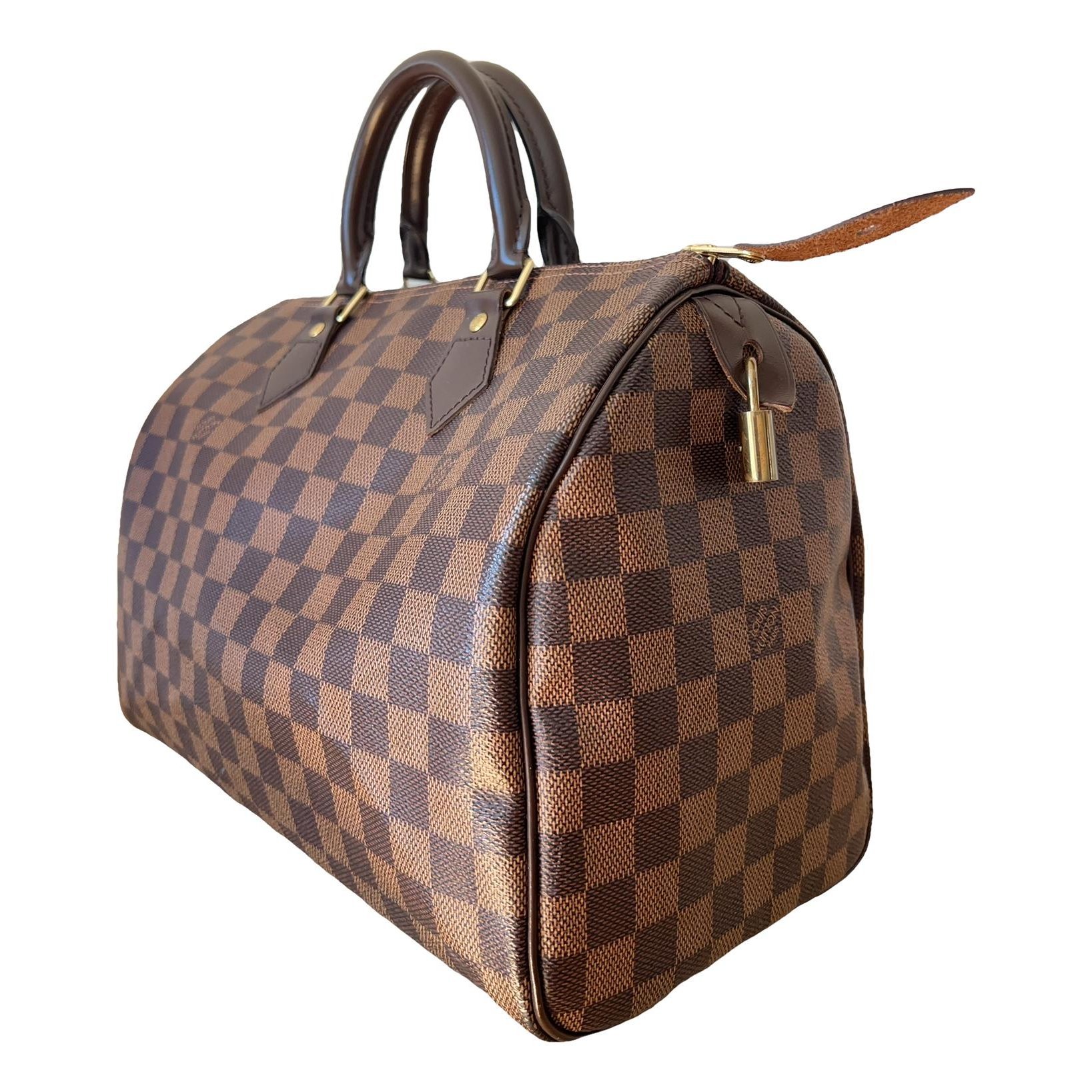 Speedy patent leather handbag