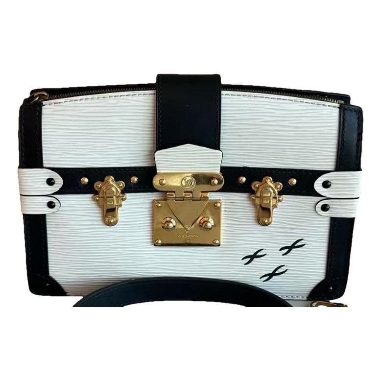 Pochette Trunk leather handbag