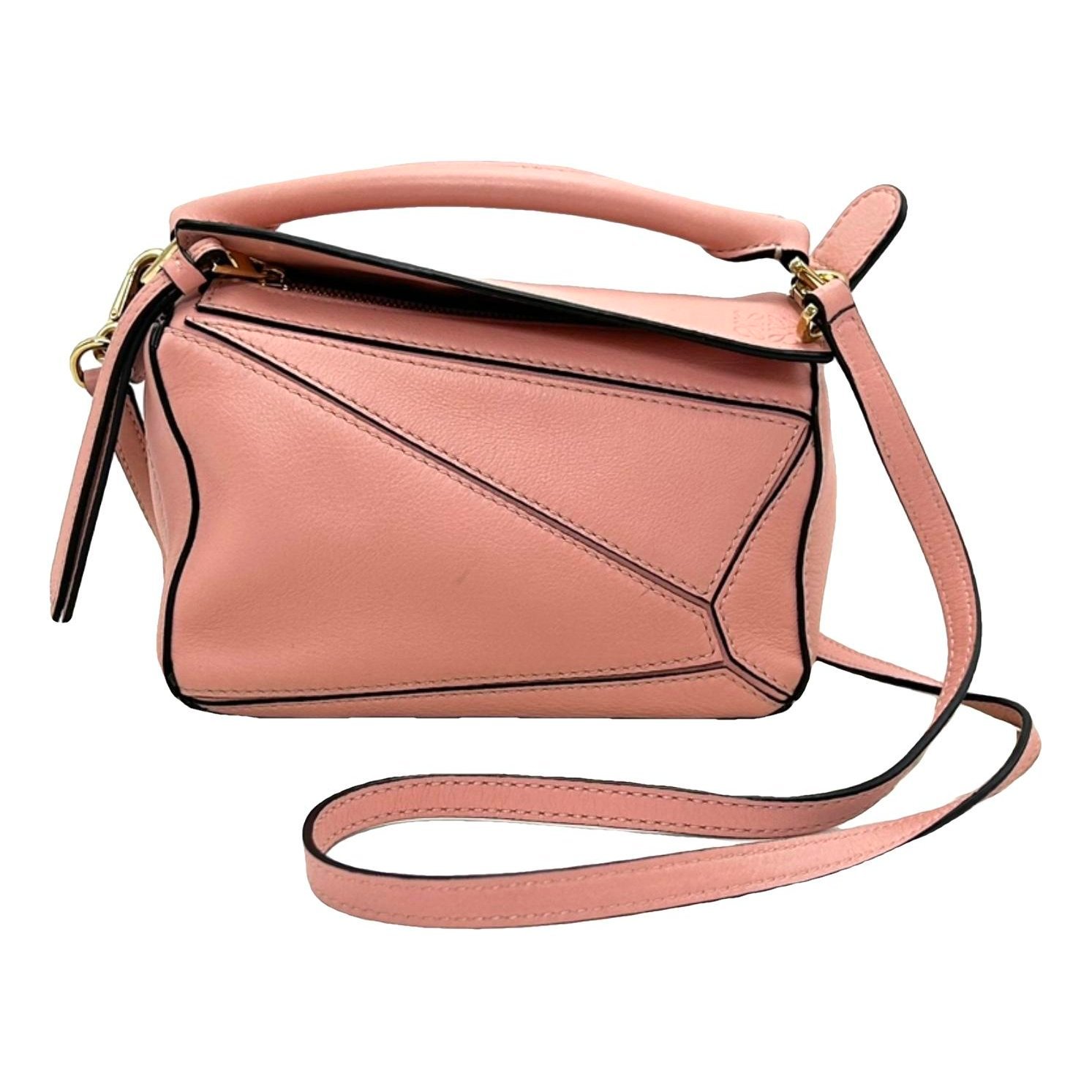 Puzzle leather handbag