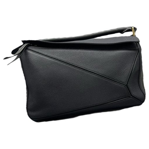 Puzzle leather handbag