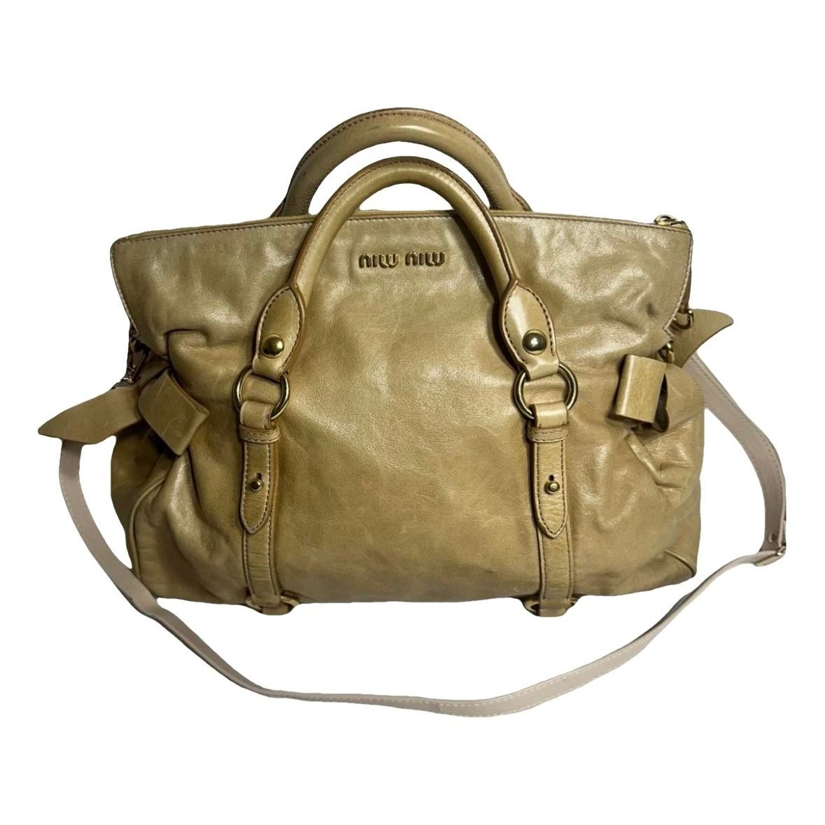 Bow bag leather handbag