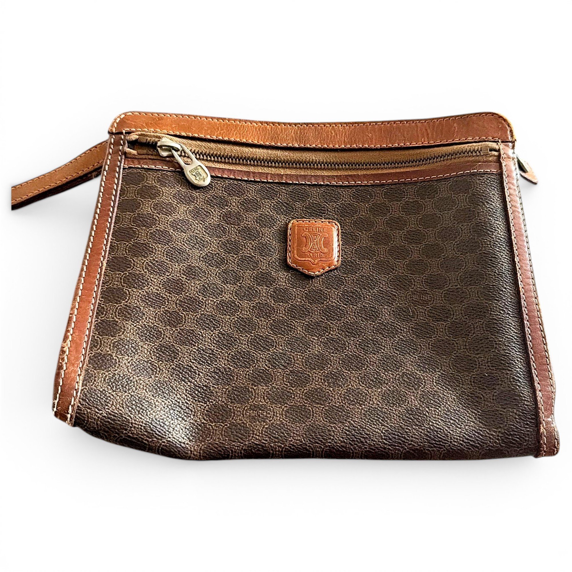 Triomphe Vintage leather clutch bag