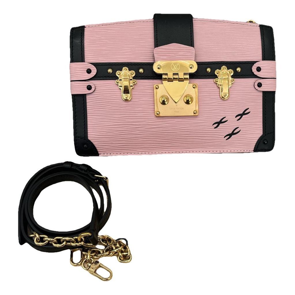 Pochette Trunk leather handbag