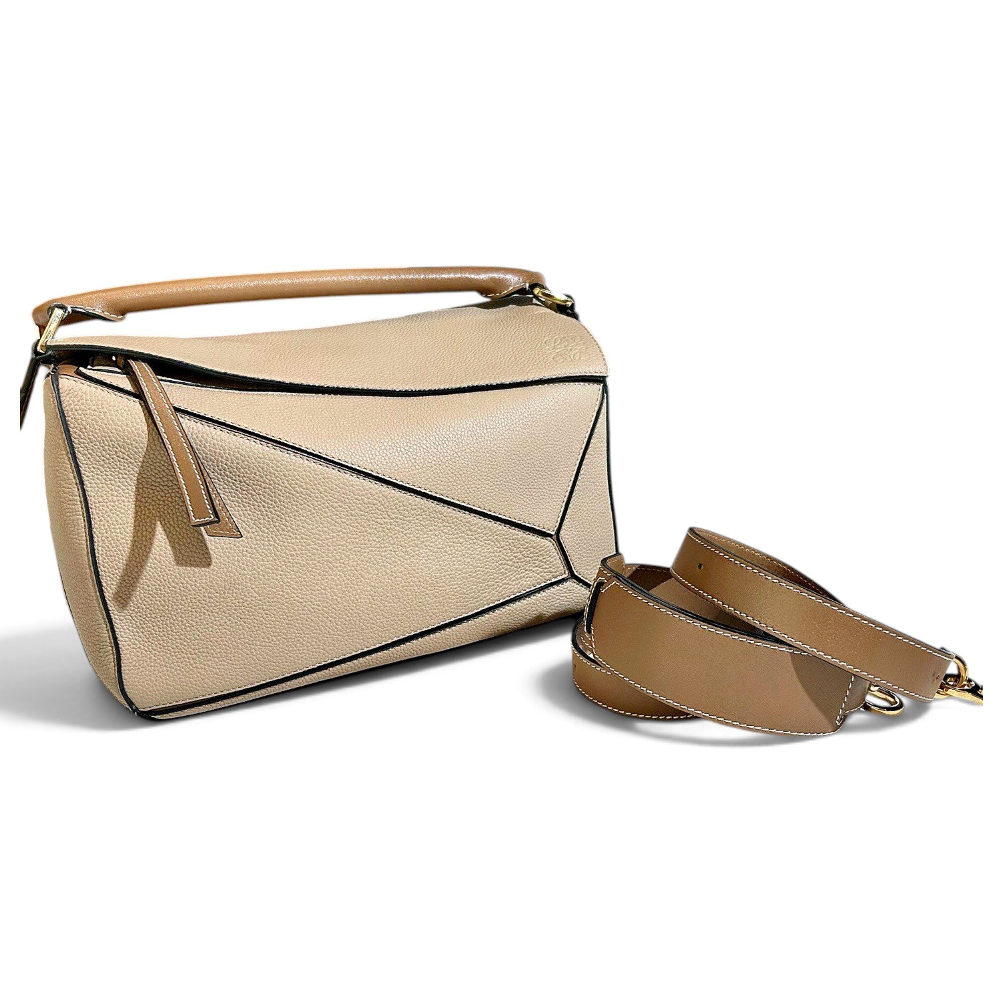 Puzzle leather handbag