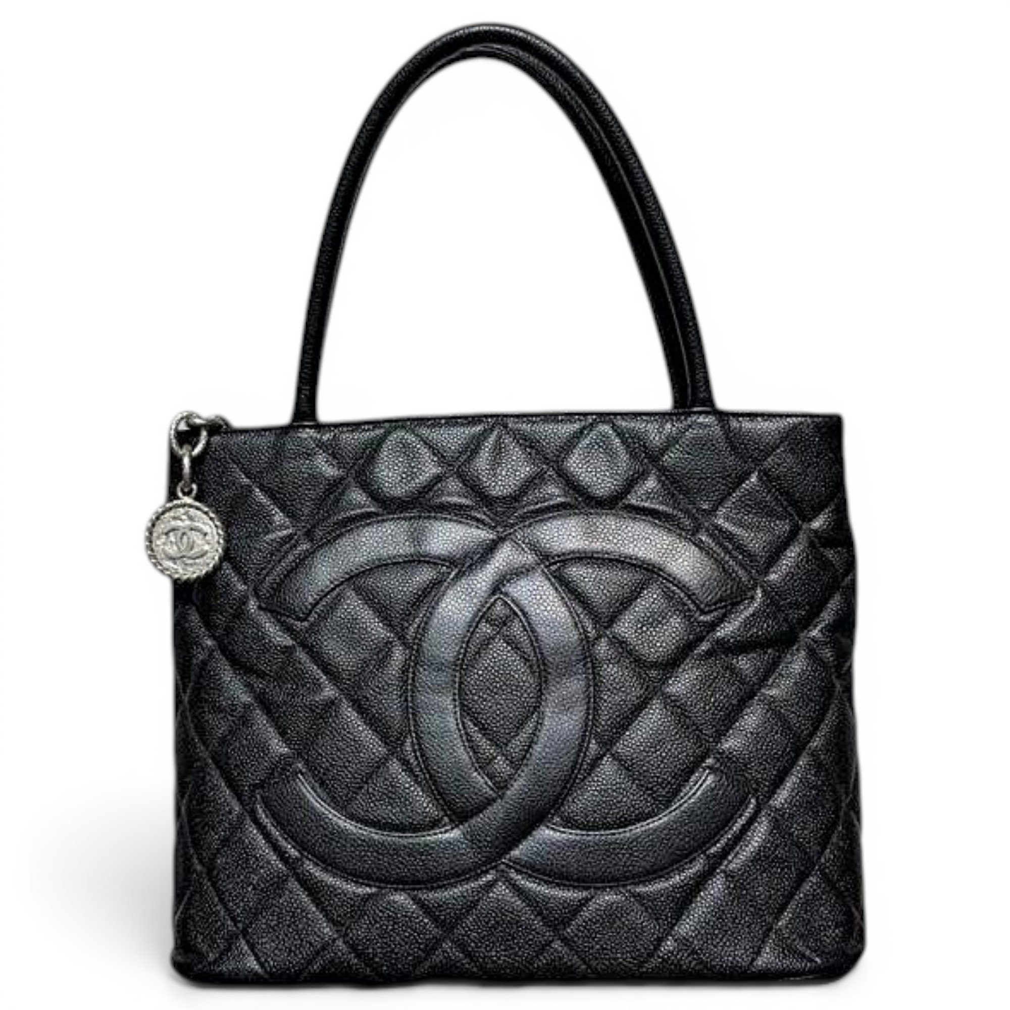 Médaillon leather handbag