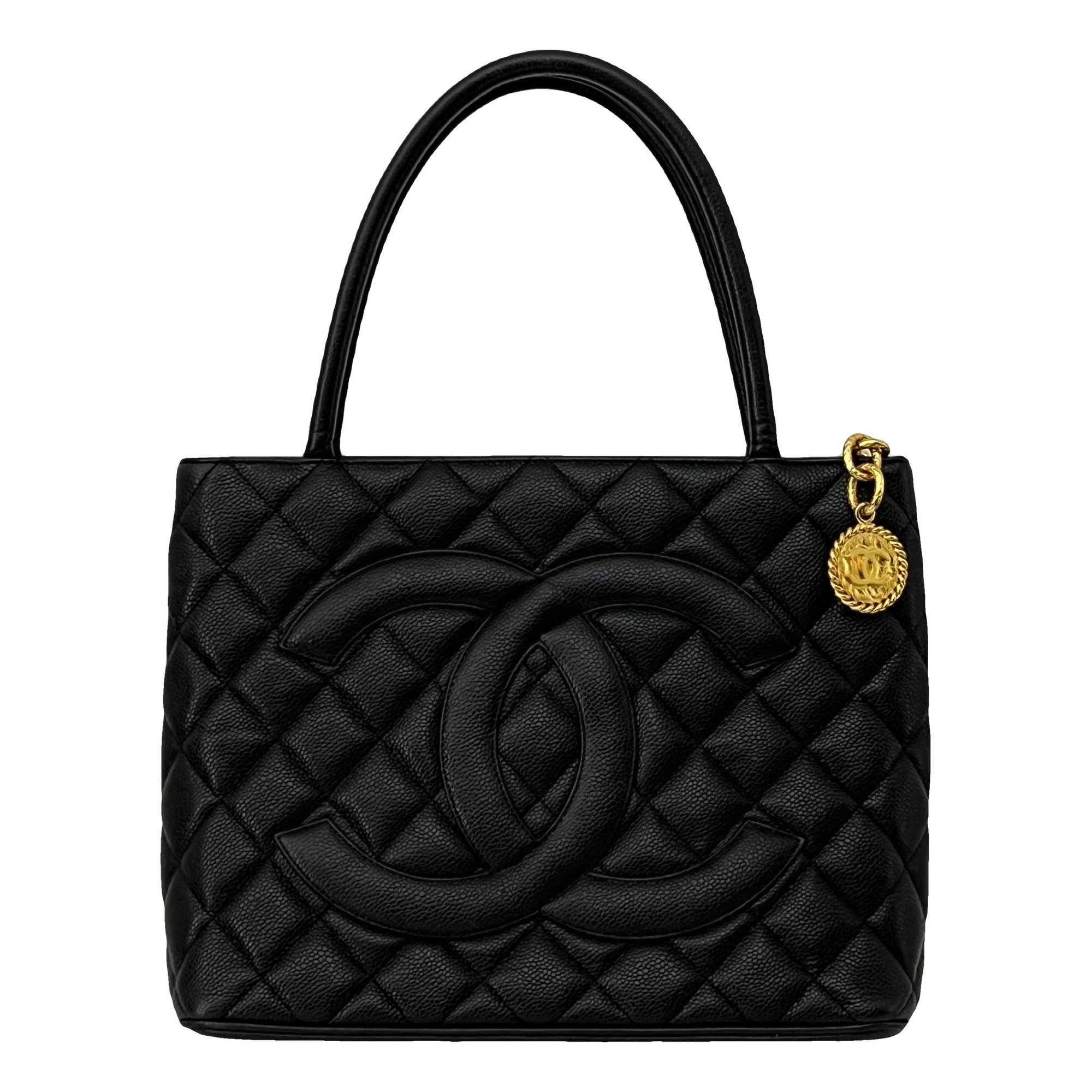 Médaillon leather handbag