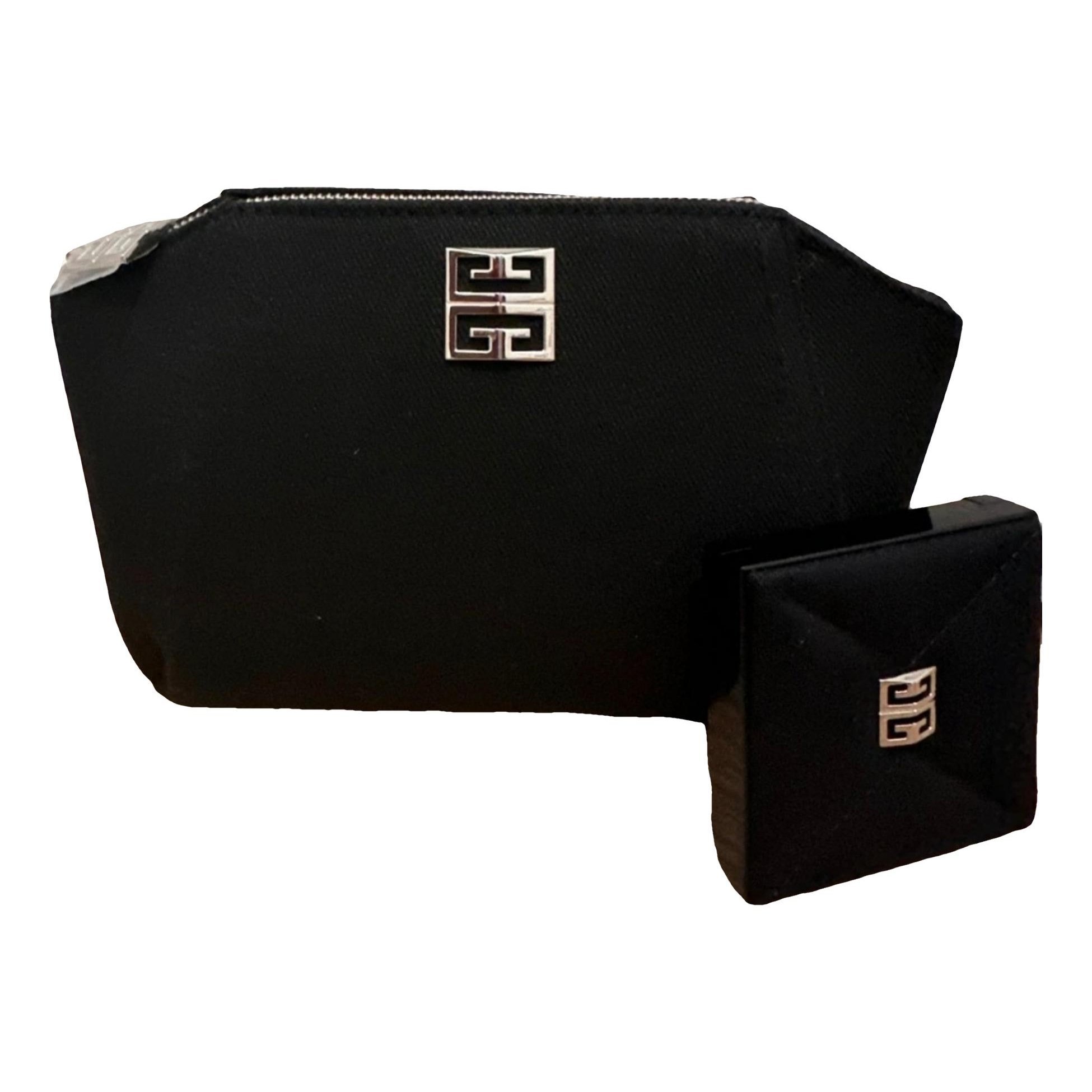 Emblem vegan leather clutch bag