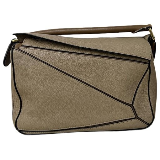 Puzzle leather handbag