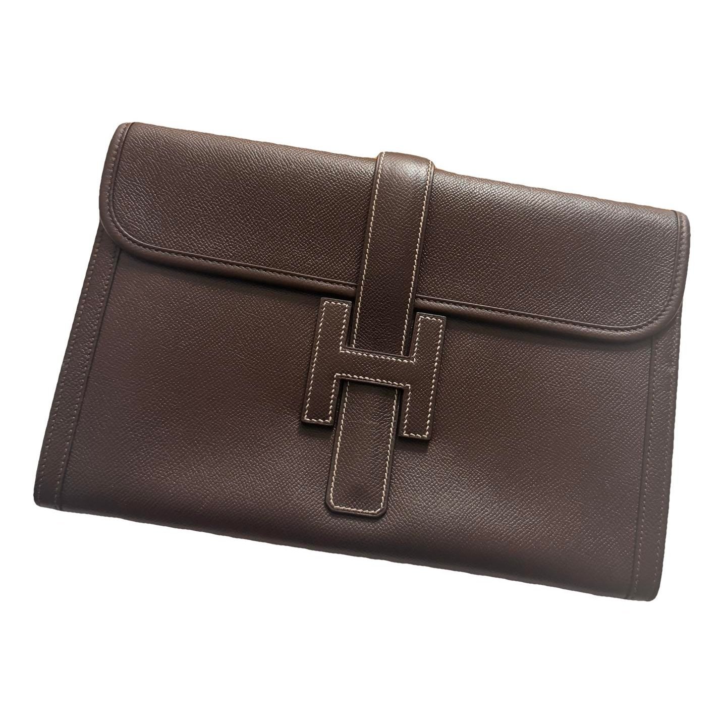 Jige leather clutch bag