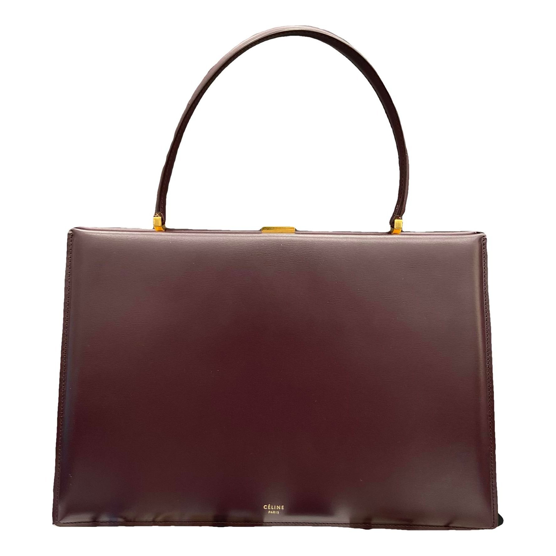 Clasp leather handbag
