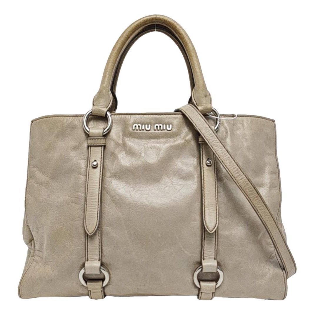 Bow bag leather handbag