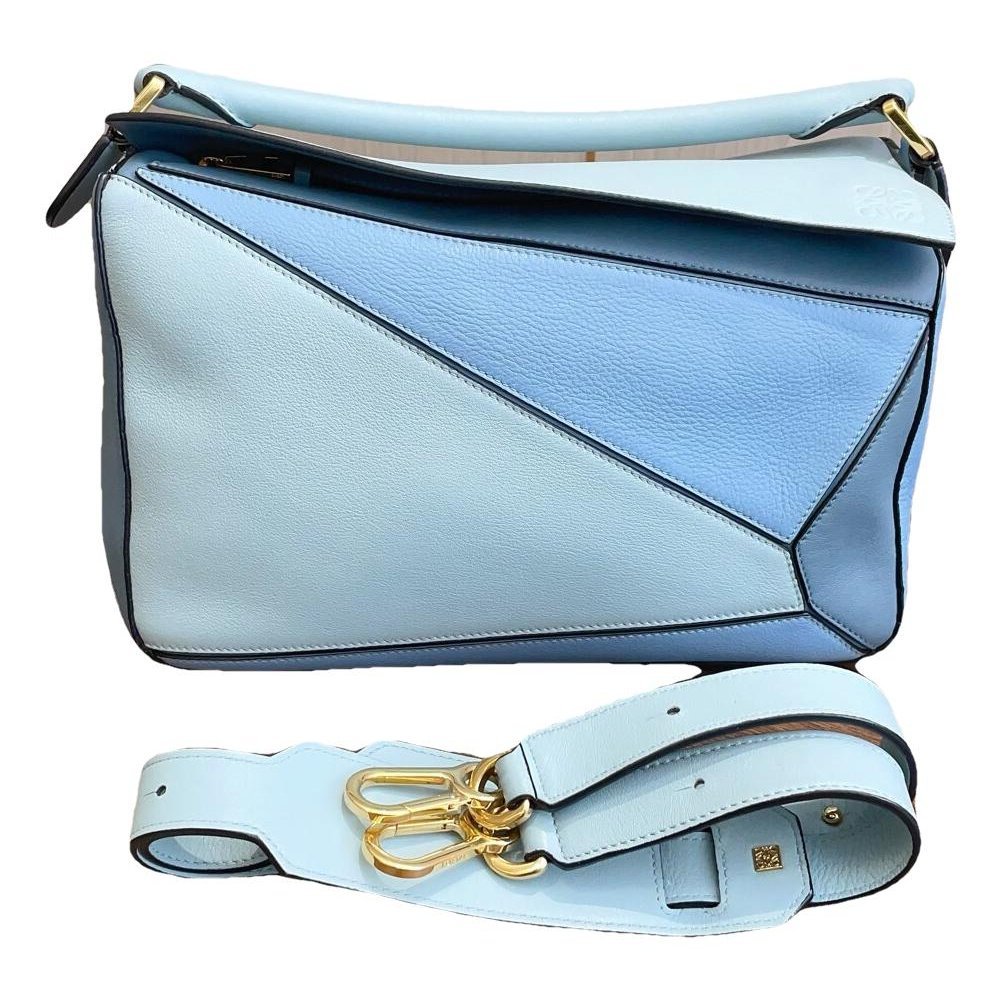 Puzzle leather handbag