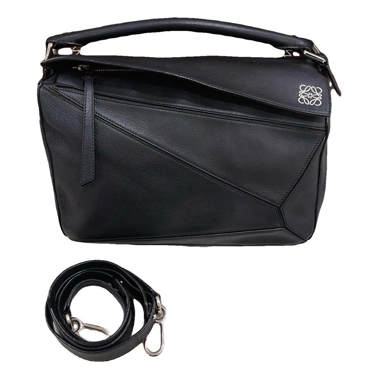 Puzzle leather handbag