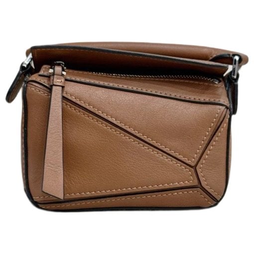 Puzzle leather handbag