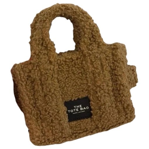 The Tag Tote faux fur mini bag