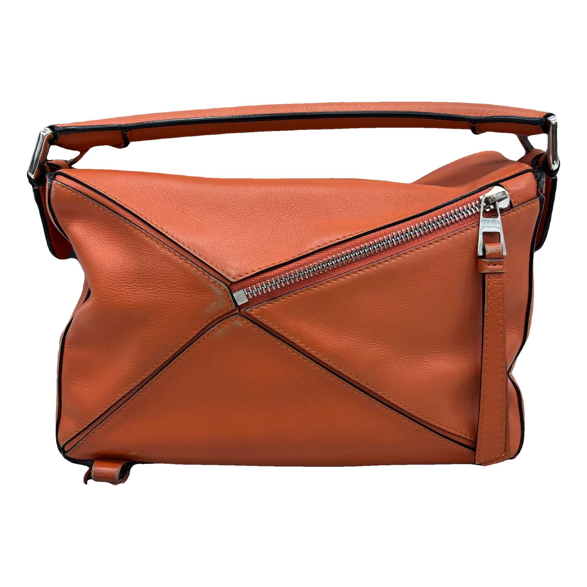 Puzzle leather handbag