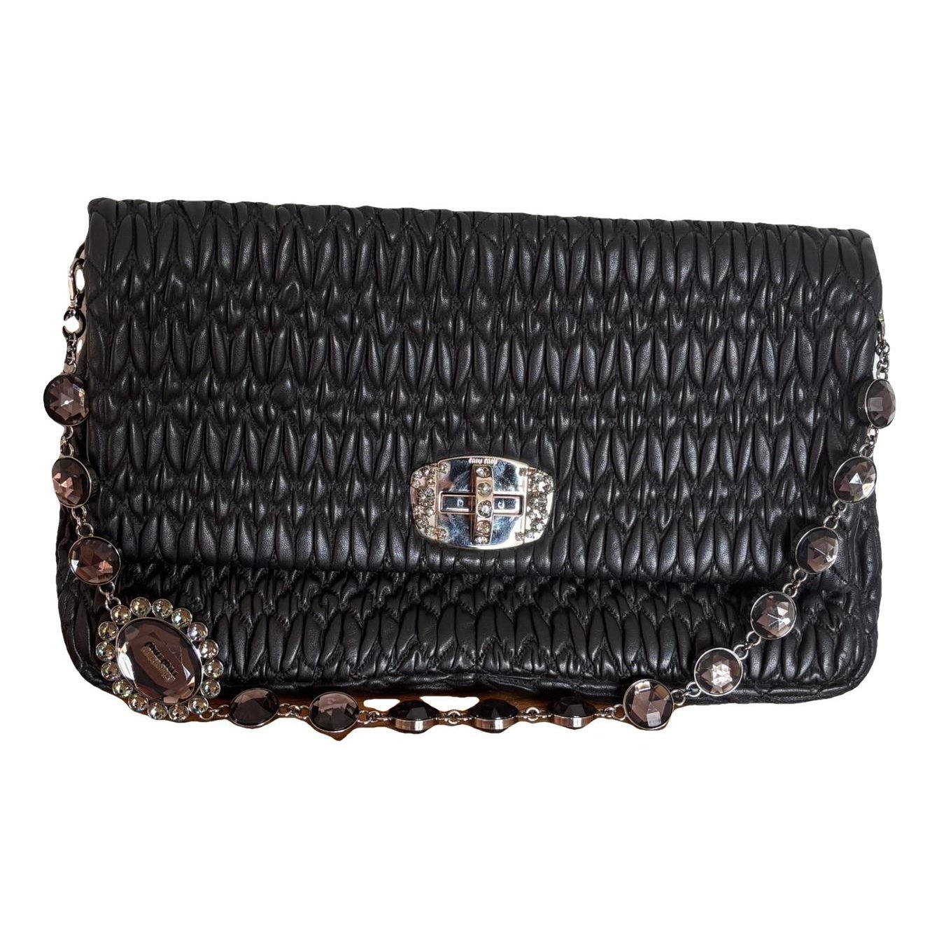 Matelassé leather clutch bag