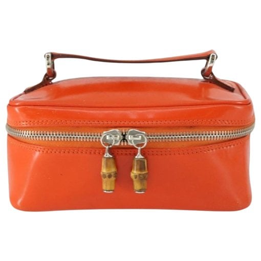 Bamboo patent leather handbag