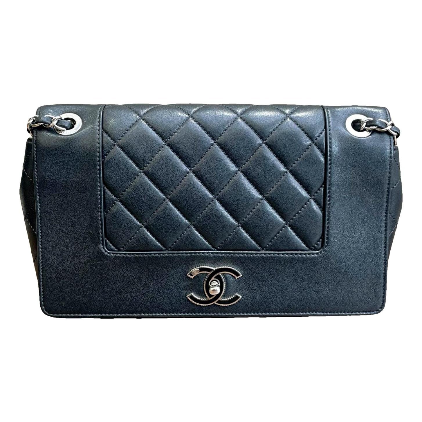 Wallet On Chain Boy Half Flap leather handbag