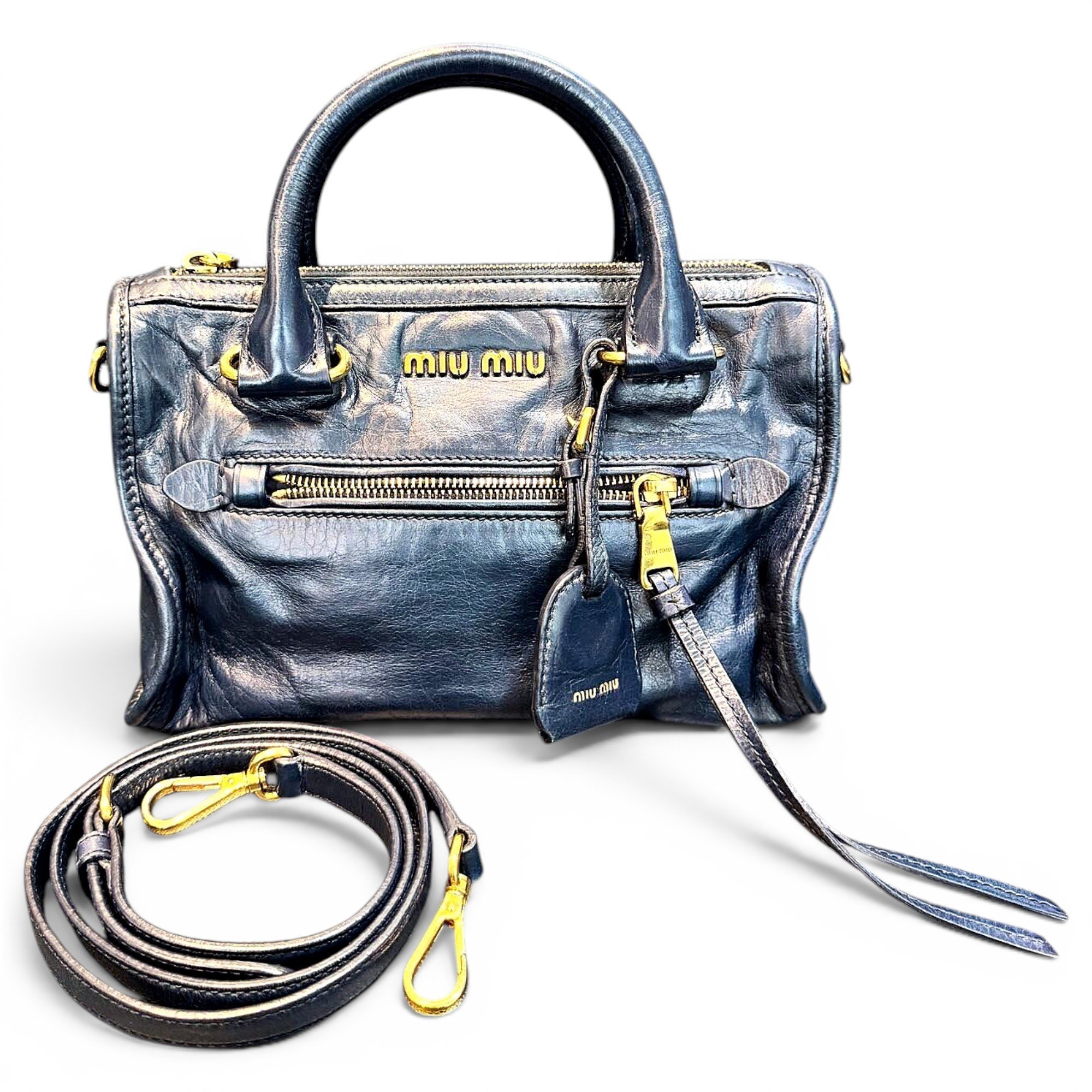 Bow bag leather handbag