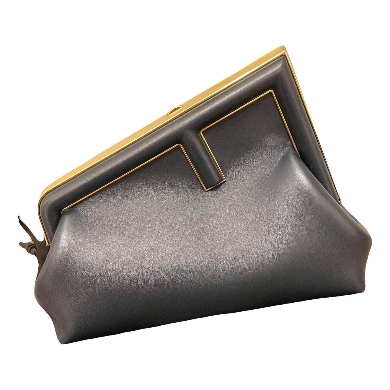 First leather handbag