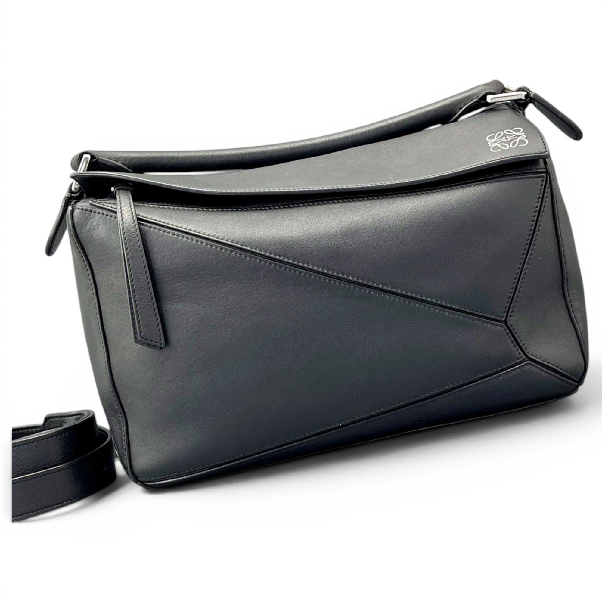 Puzzle leather handbag