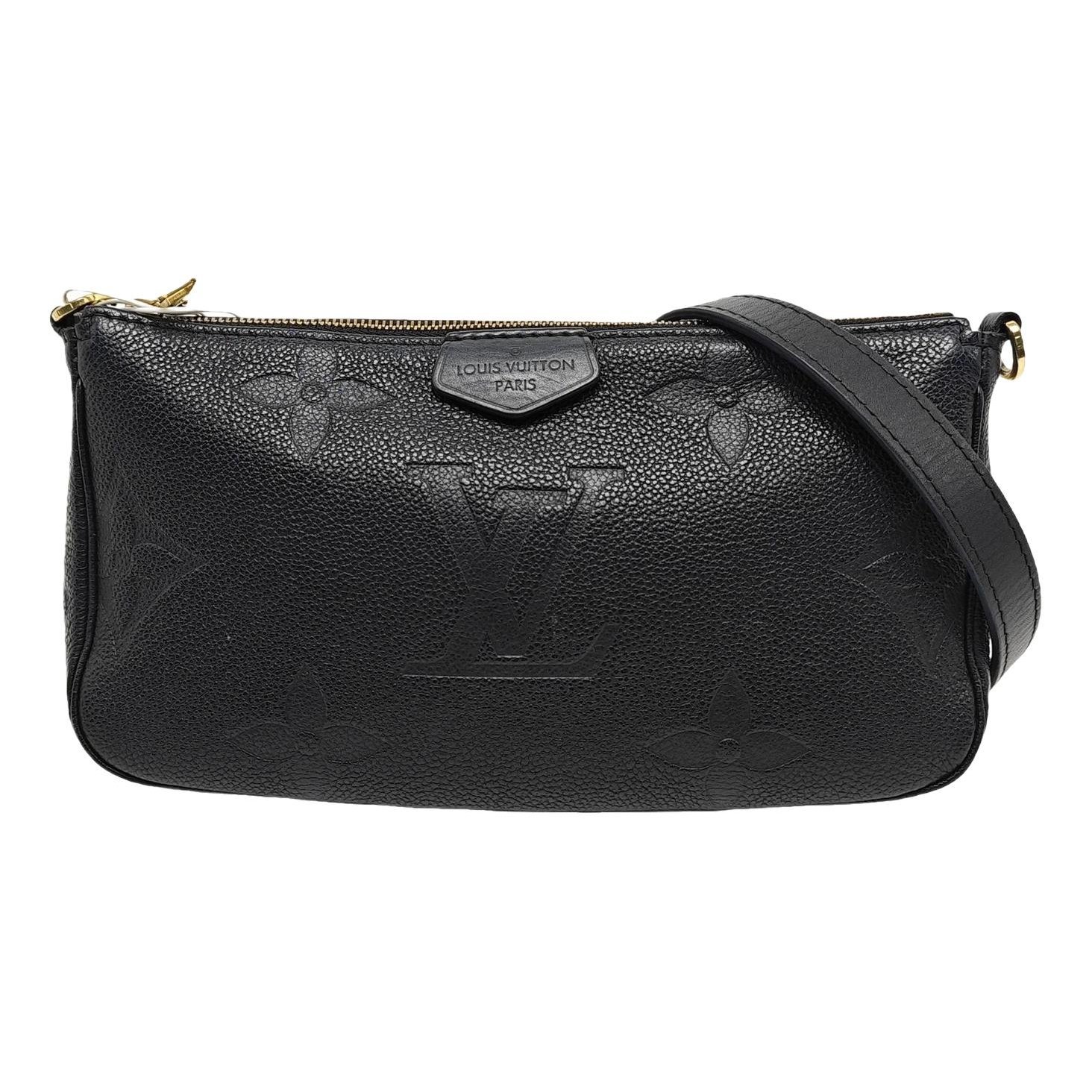 Maxi Multi Pochette Accessoires leather handbag