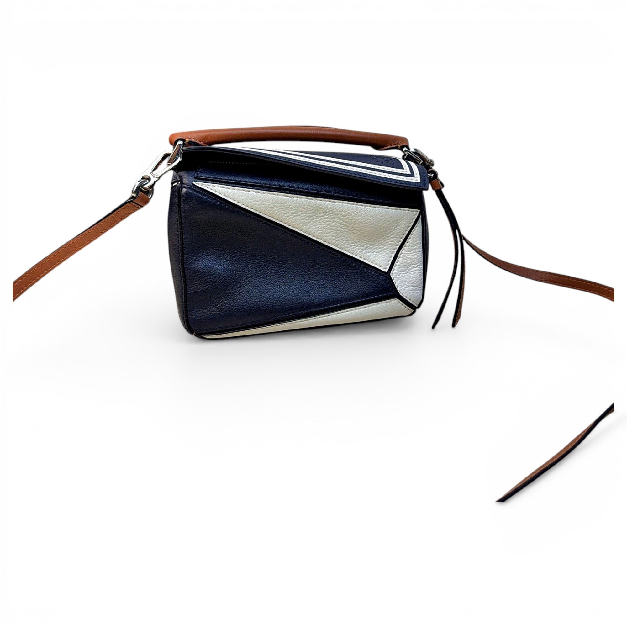 Puzzle leather handbag