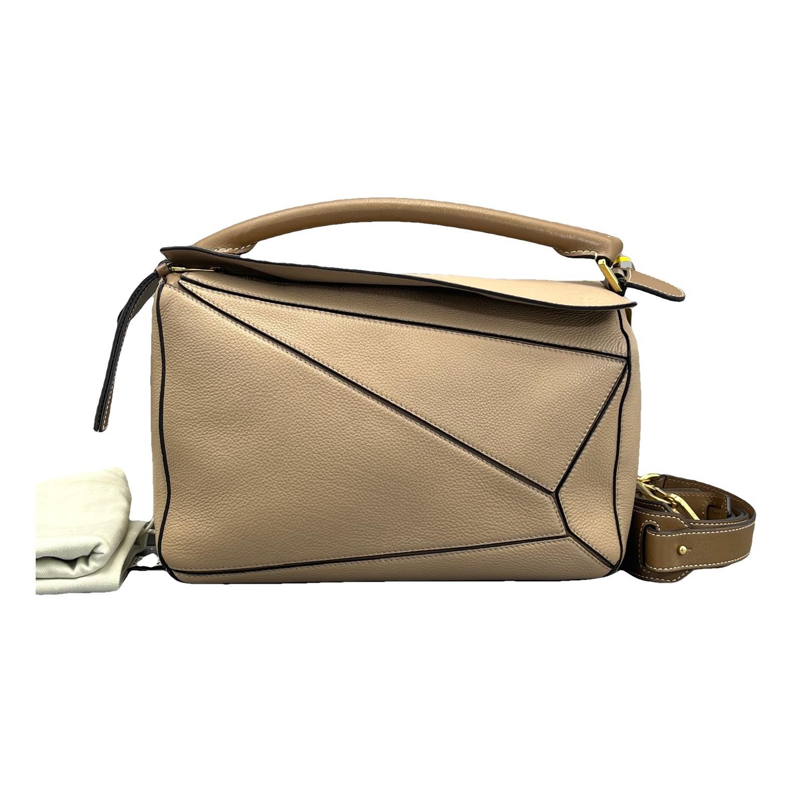 Puzzle leather handbag