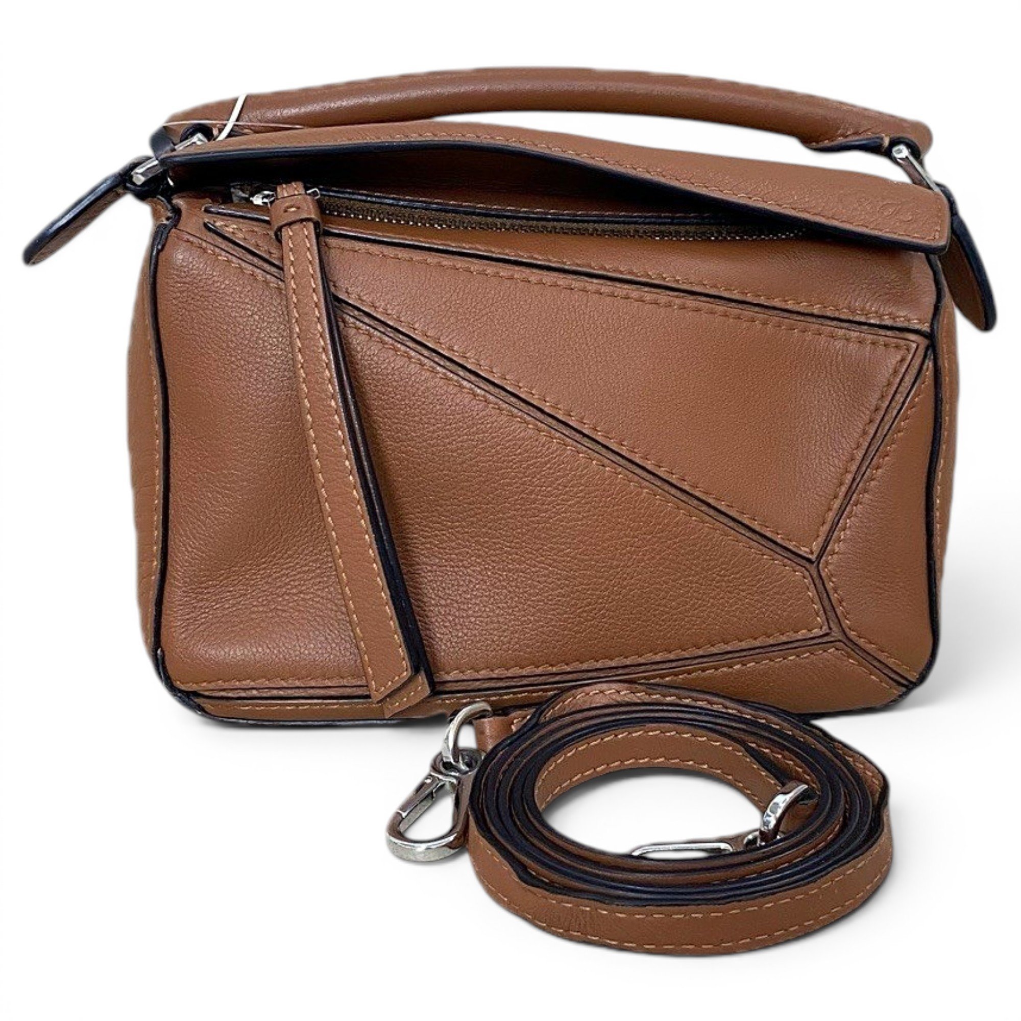 Puzzle leather handbag
